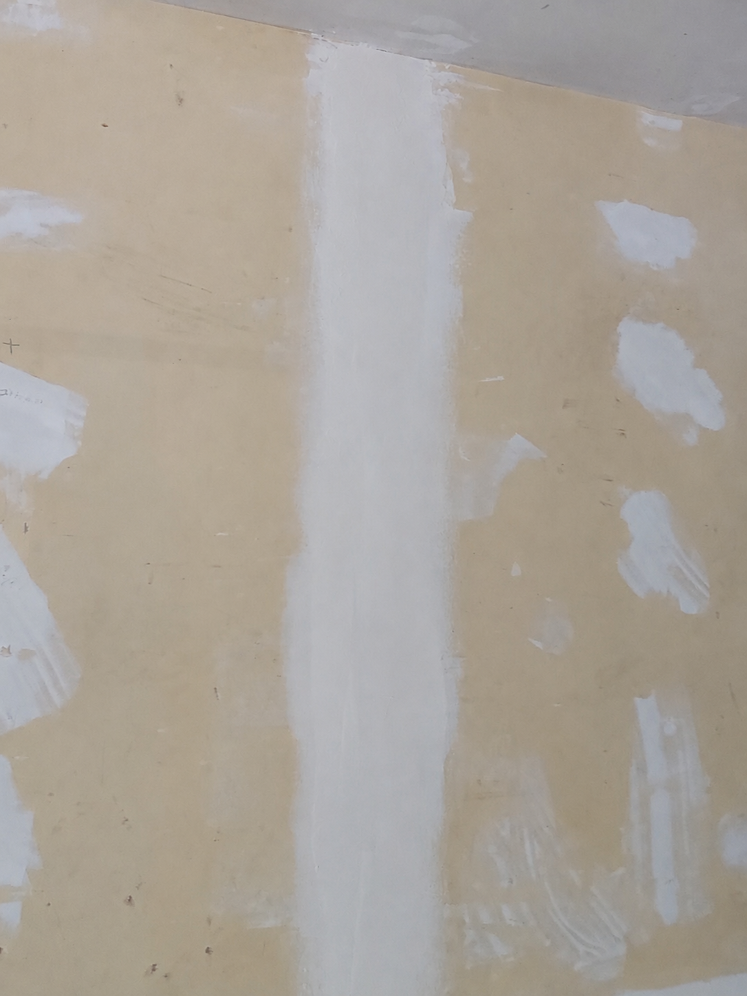 finishing-compound-feathered-over-drywall-seam.png